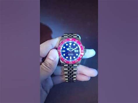 Rolex GMT Master II 126710BLRO Pepsi Bezel under UV light